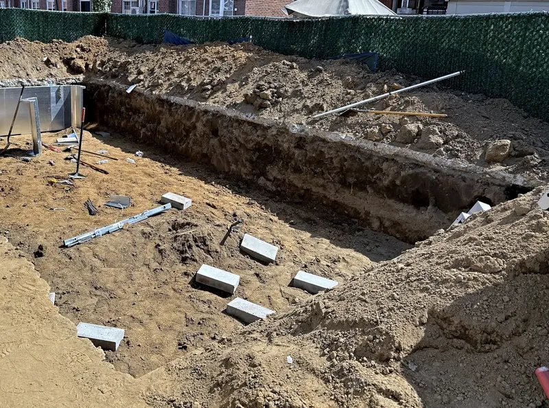 Excavation opened and the first wall panels staged