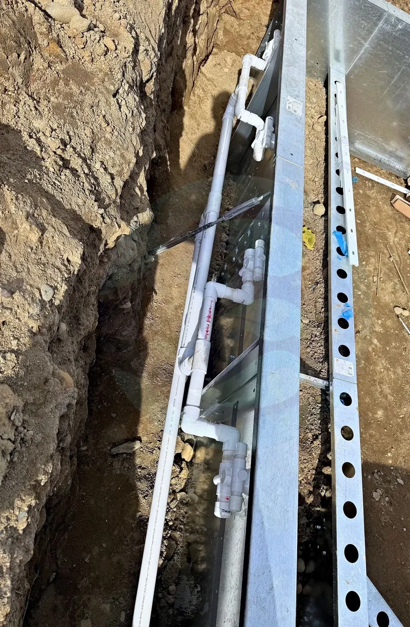 Return and skimmer plumbing run along the wall bracing