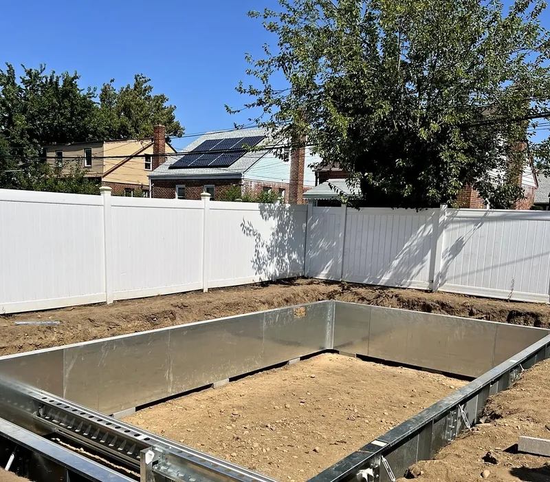 Excavation complete and steel wall panels set and braced