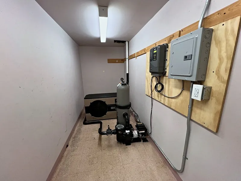 Equipment room overview – heat pump, filter, pump and controls